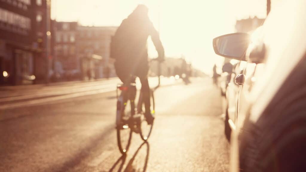 Is it possible for cyclists to file lawsuits against cities for road hazards